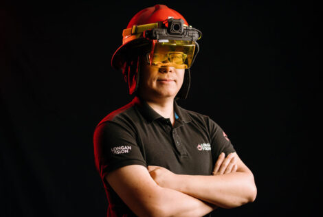 Enzo Jia wears an augmented reality visor for firefighters.