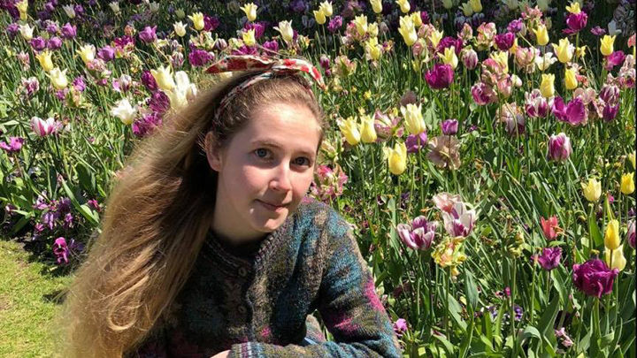 Lacey Wice in a field of colourful tulips