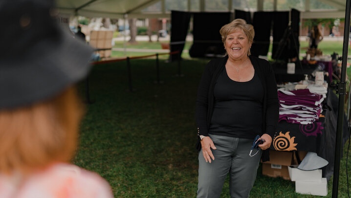 Heather Sheardown speaking at an event taking place outside.