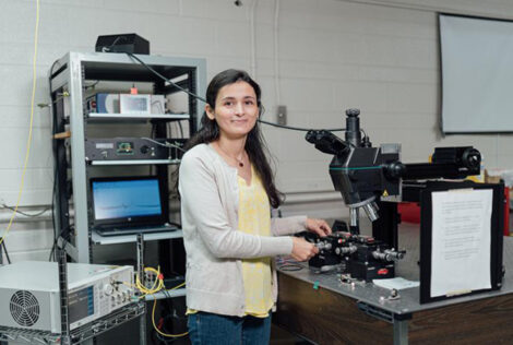 Khadijeh Miarabbas Kiani poses with a telescope