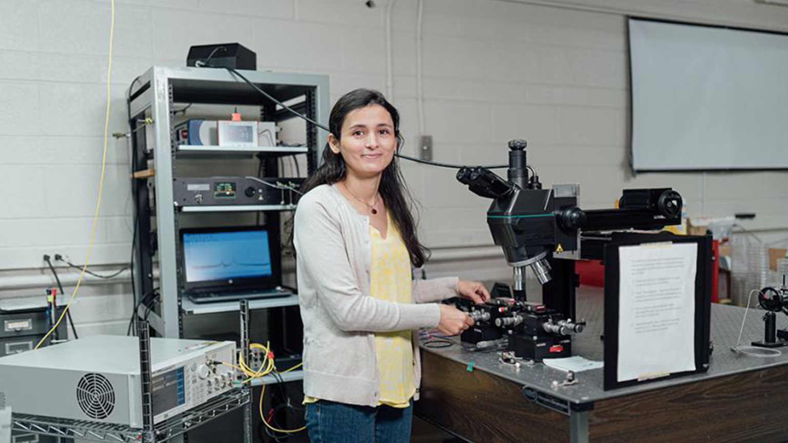 Khadijeh Miarabbas Kiani poses with a telescope