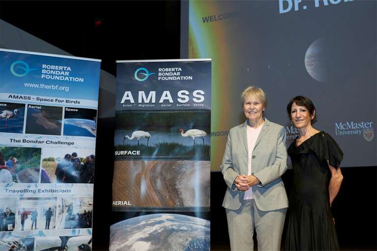 Roberta Bondar poses with W Booth School of Engineering Practice and Technology professor Gail Krantzberg.