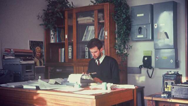 John Bandler works at a desk in 1966.