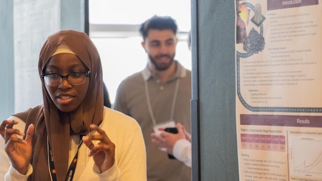 Halima is talking with her hands with people