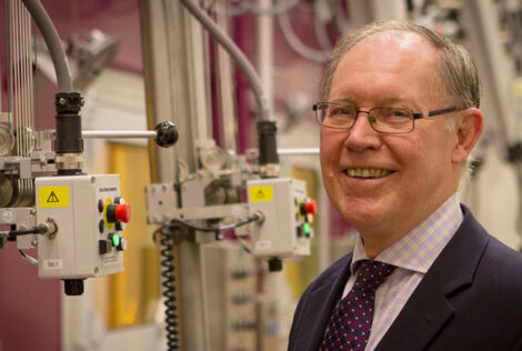 Headshot of Prof. John Luxat in the nuclear hot cell room