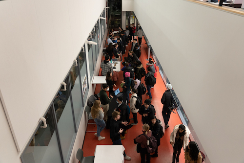 aerial view of people in a hallway.