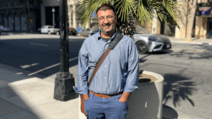 man standing outside on a street