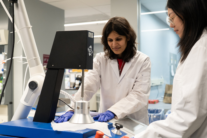 Shanbhag and Wu working on a filtration test after proceeding filter materials.