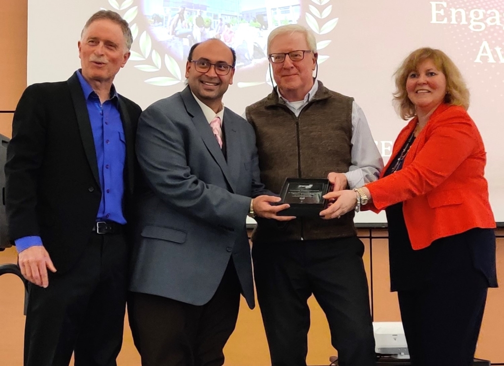 Dr. Brian Baetz, Salman Bawa and Richard Allen collecting the Community Engagement Award and the MSU Awards, March 26, 202