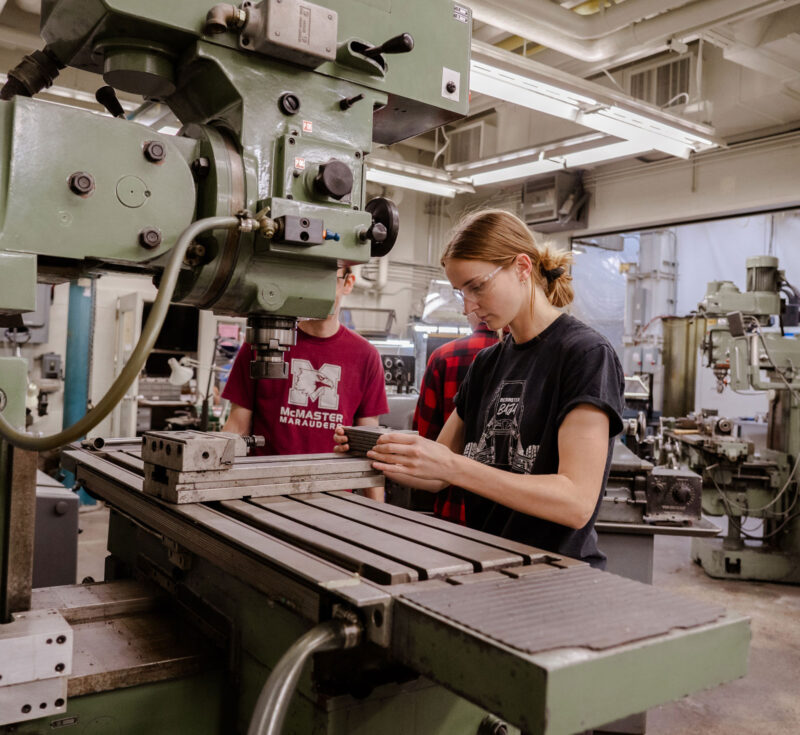 Student working on machine