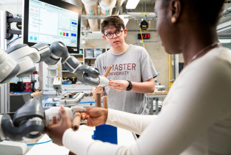 Students collaborating in WBooth Learning Factory