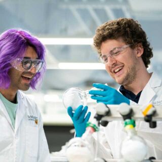 Students in a chemical engineering lab.