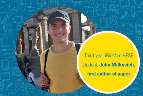 John Milkovich smiles. The text says third-year iBioMed HESE student, John Milkovich, first author of paper.