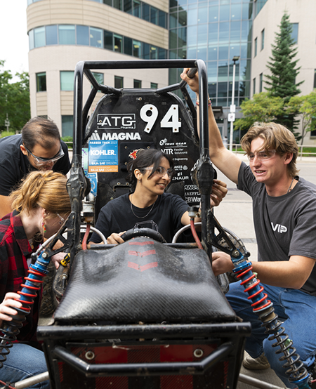 Baja racing team working on their racecar