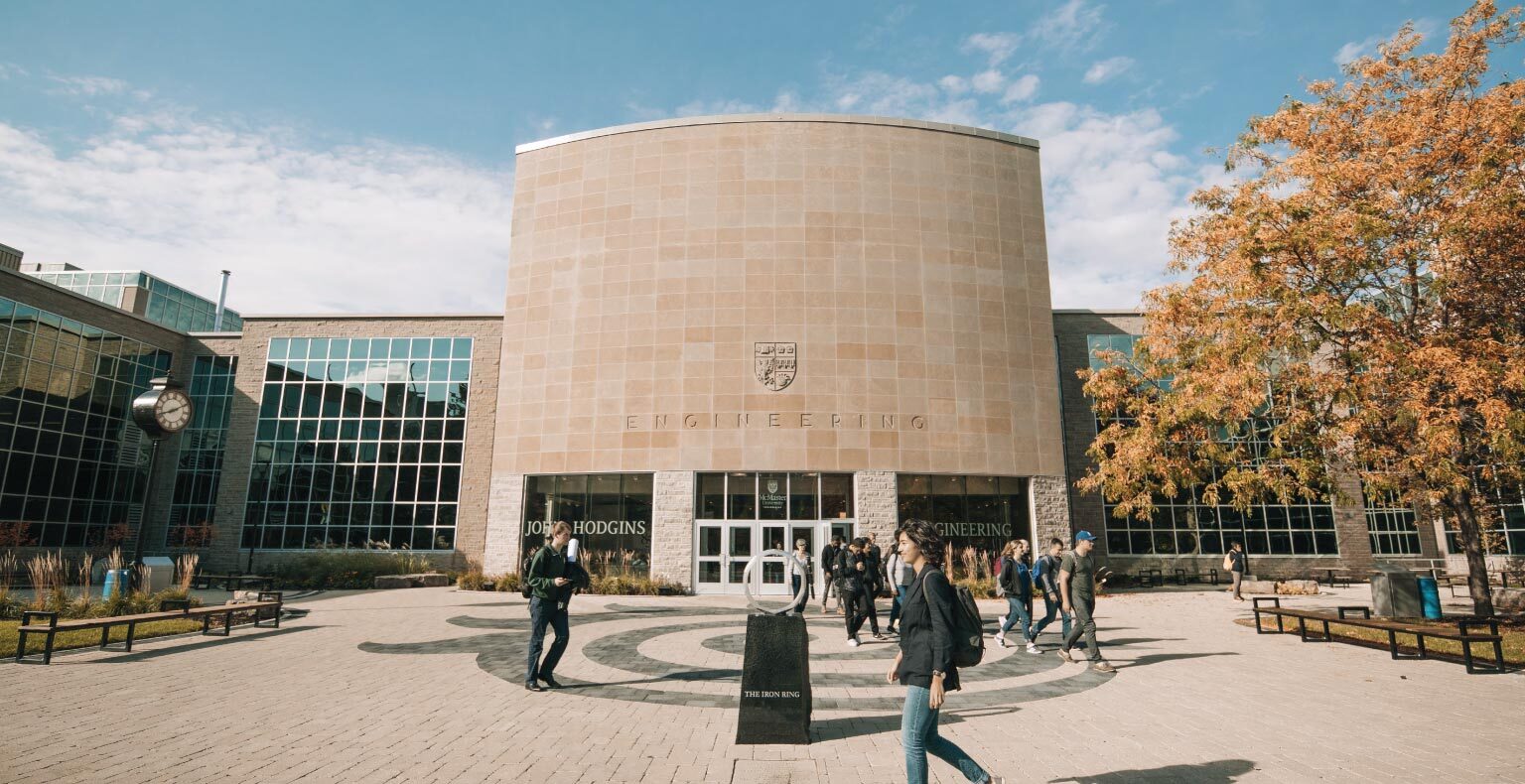 JHE building, students walking around the building
