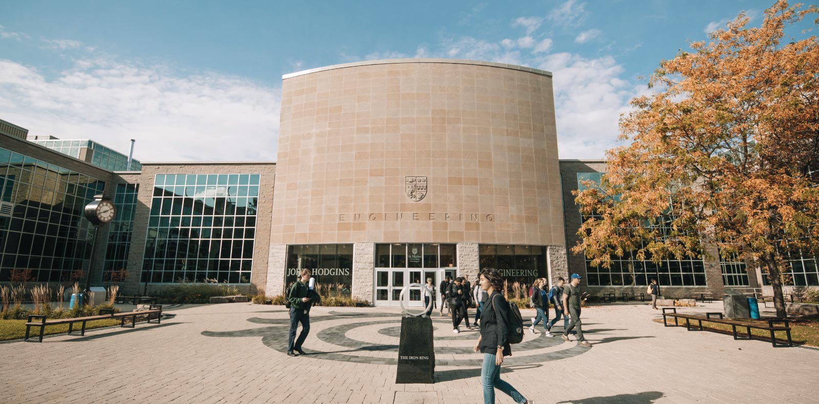 JHE building, students walking around the building