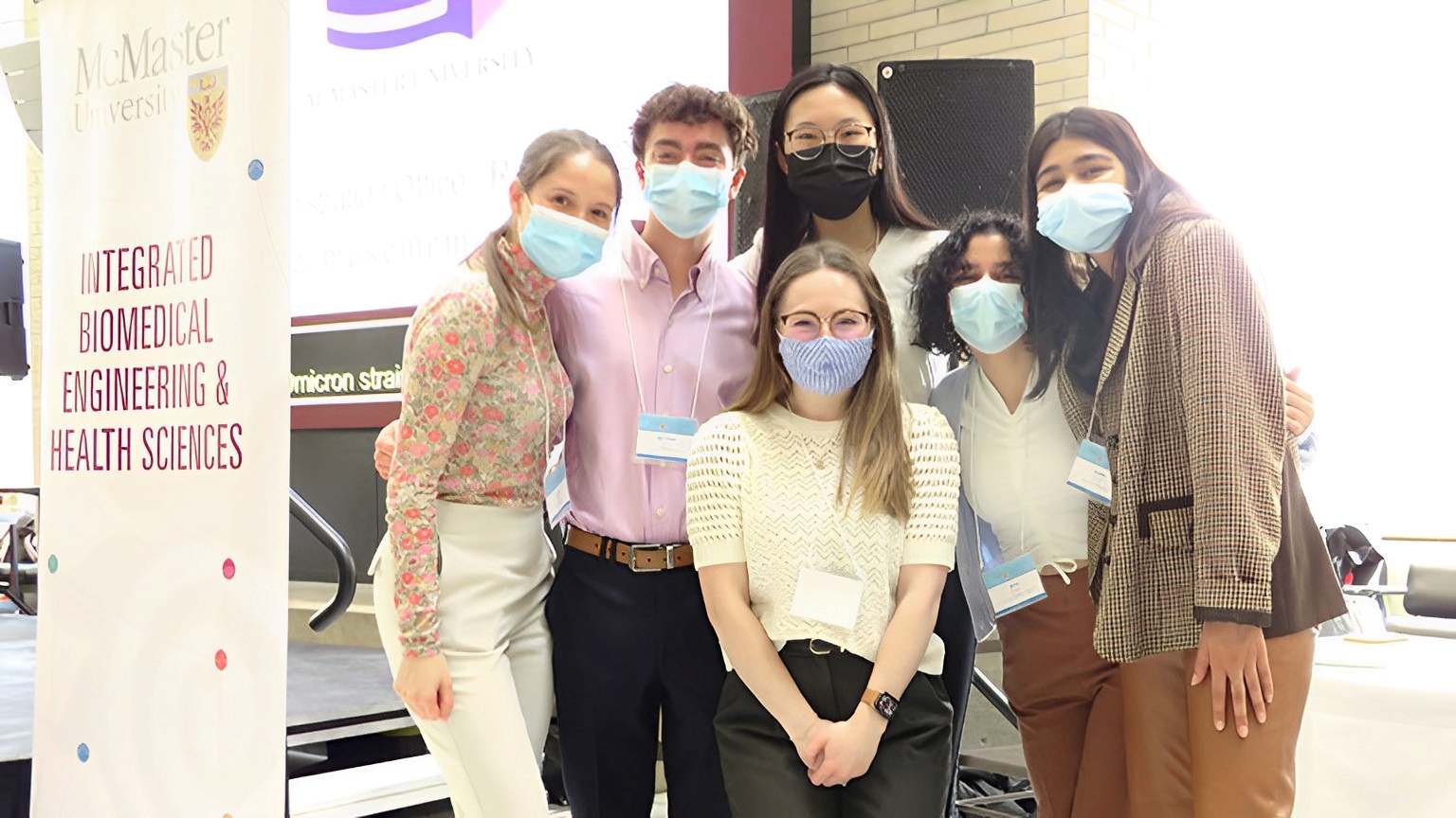 a group of ibiomed students stand together