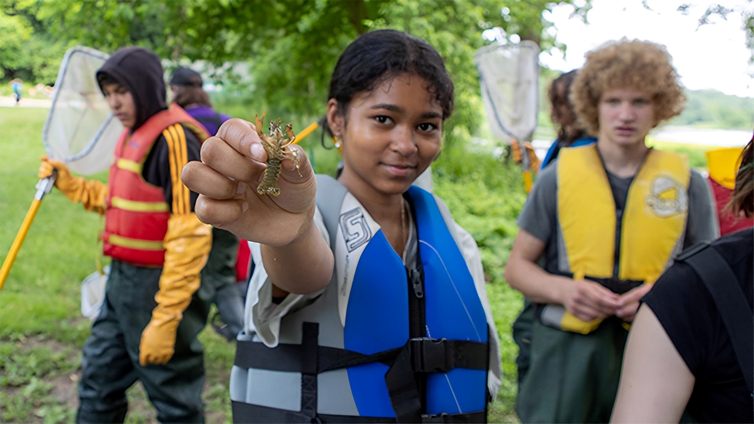 Grade 9 Khadeeja Fazal shows off a bug they found beneath a rock as part of a day filled with STEAM activities organized by McMaster and University of Waterloo.