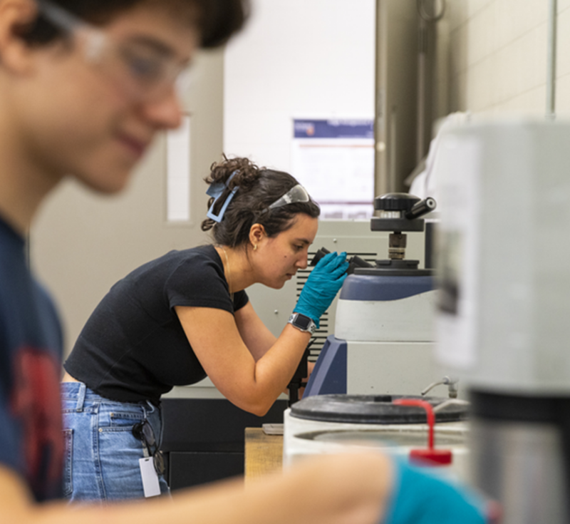 Students in MMRI looking at equipment