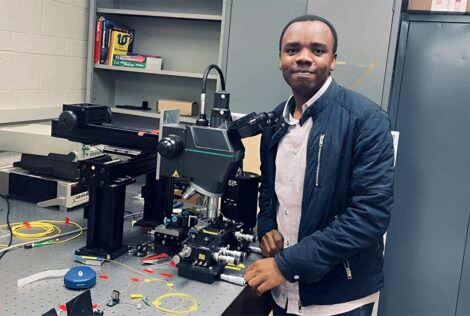 Hamidu Mbonde poses in a lab