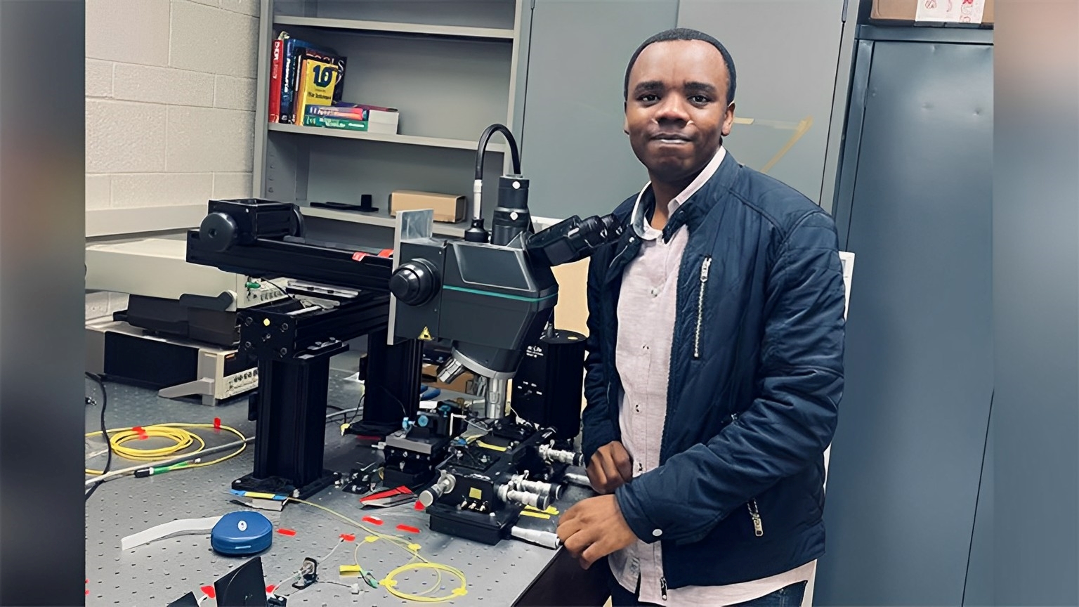 Hamidu Mbonde poses in a lab