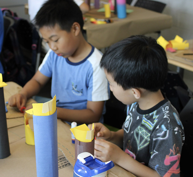 Two students working on a STEM activity