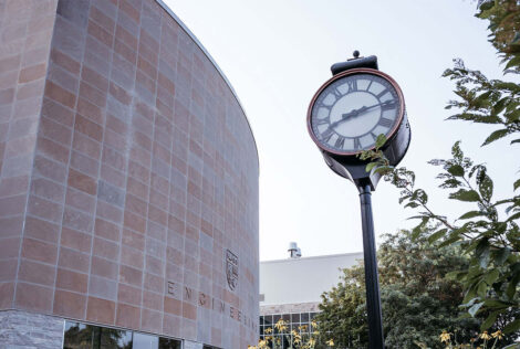 A clock outside the John Hodgins Engineering Building