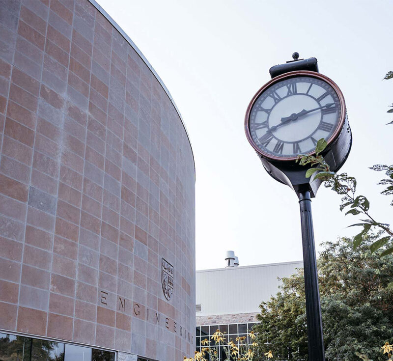 A clock outside the John Hodgins Engineering Building
