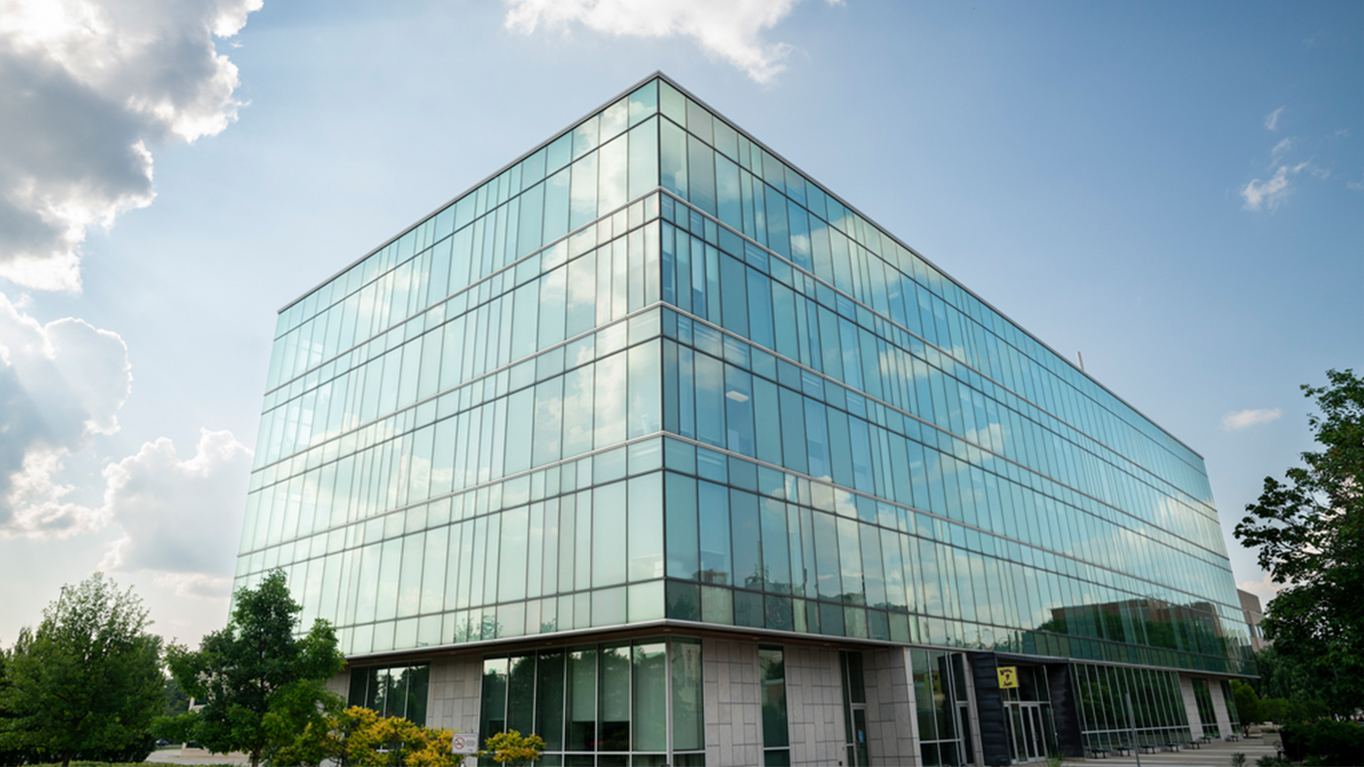 Engineering Technology Building with a cloudy blue sky