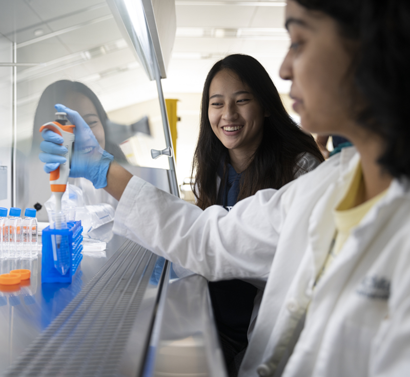 Students working in a lab with scientific instruments