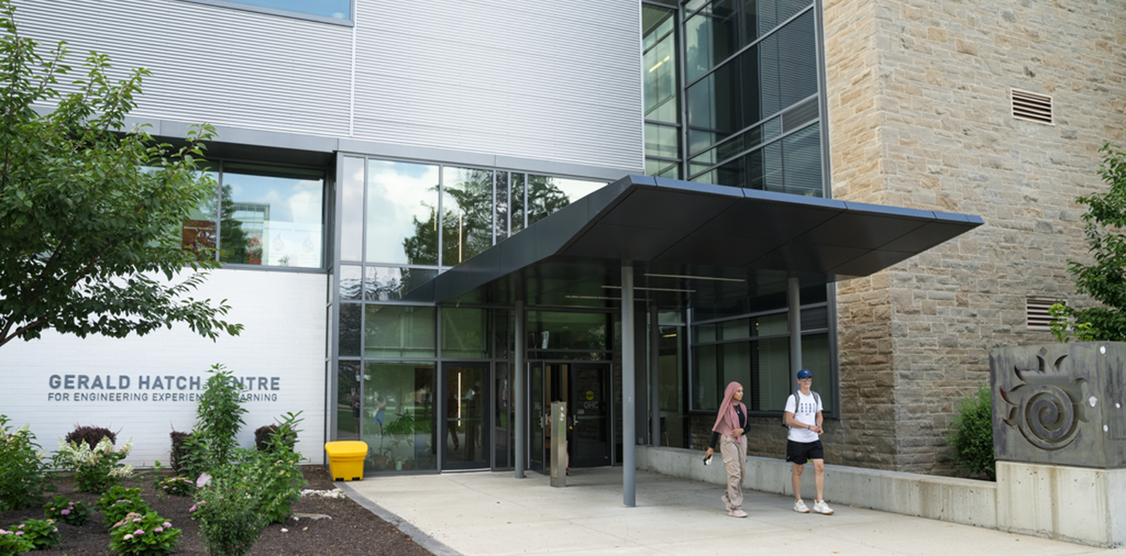 Hatch exterior with students walking