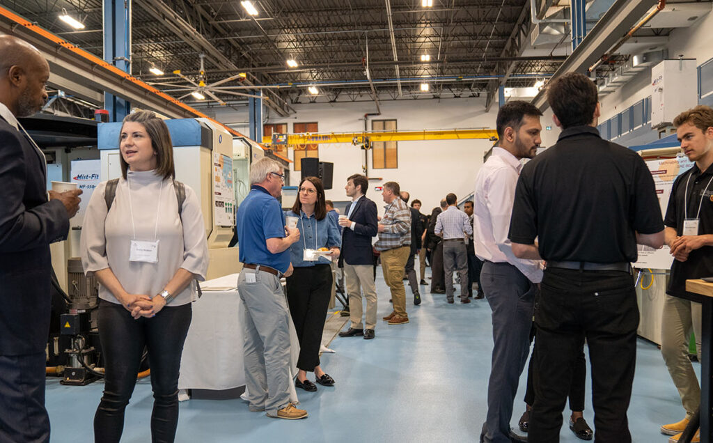 People networking at the MMRI open house