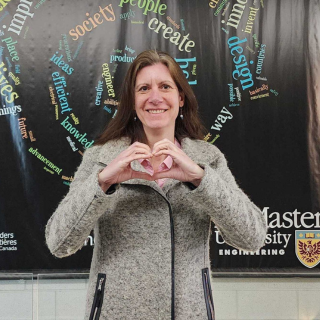 Andrea Hemmerich posing with heart hands