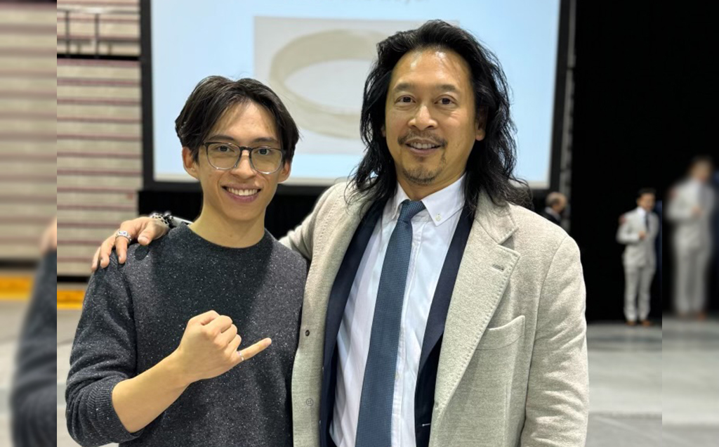 Sawyer and Michael Tang pose with their Iron Rings