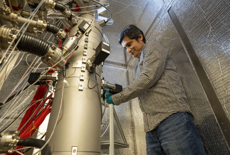 Dr. Maureen Joel Lagos working on the Nion HERMES 100 electron microscope.