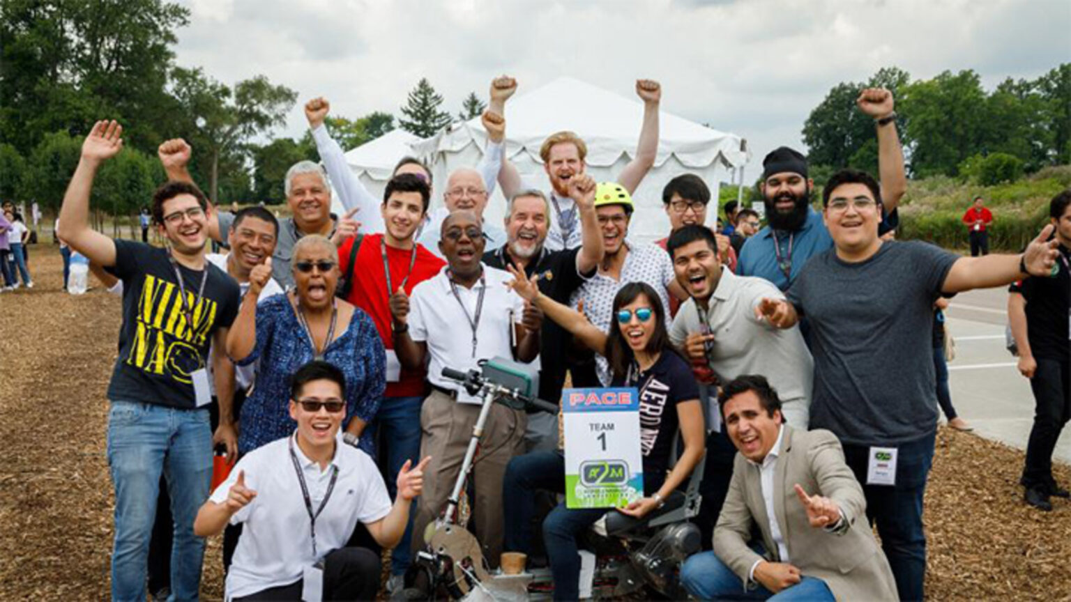 Picture of international student team winning prestigious automotive engineering design award