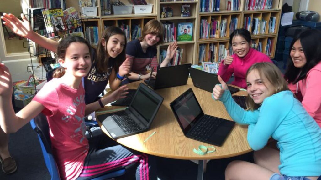 Picture of kids coding together