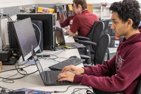 Students working on computers at the McMaster Centre for Software Certification