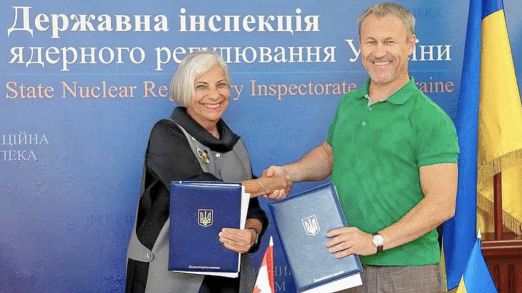 Rumina Velshi and Oleh Korikov, the Ukrainian head nuclear regulator (Oleh Korikov) executing an MOU during a visit to Ukraine