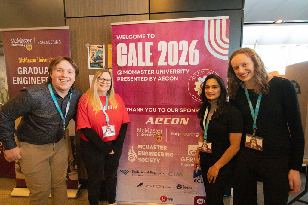 People posed by a CALE 2026 banner