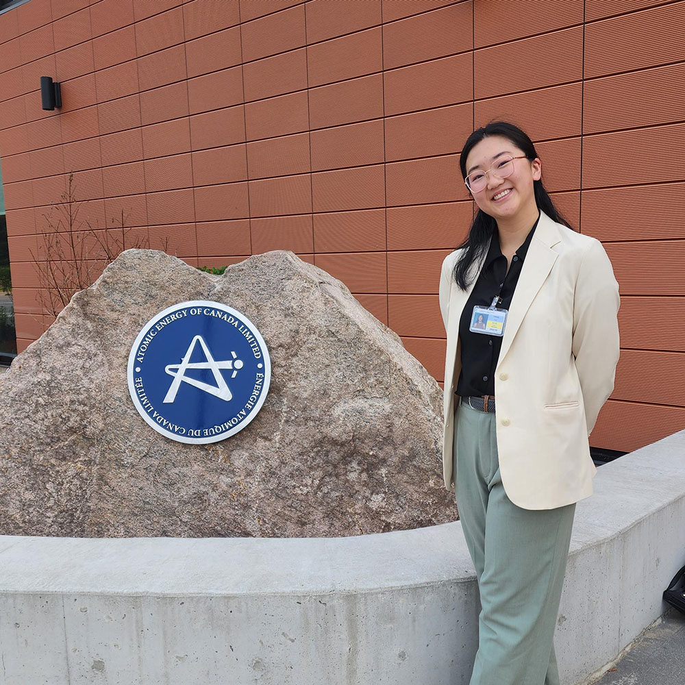 Spring Fu standing outside of a building