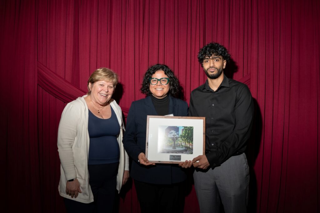 Two Lobo employees pose with Heather Sheardown