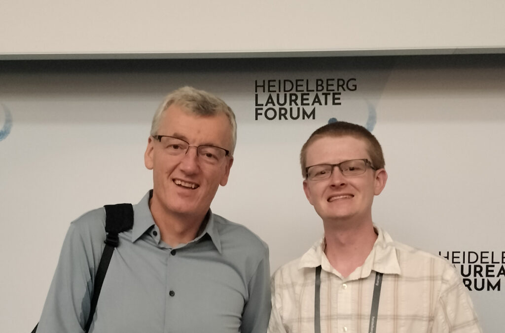 Chris poses with Sir Dr. David MacMillan