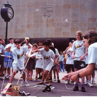 Kids working together in an activity at Venture Summer Camp in 1995