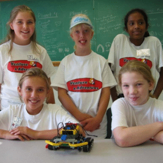 Kids posing with creation at Venture Summer Camp 2002