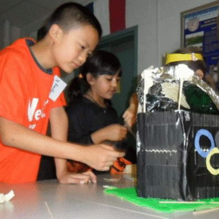 Kid tinkering in summer camp in 2010