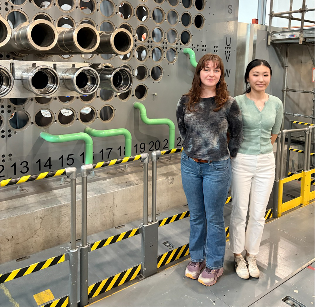 Students Camille and Yuri pose inside Ontario Power Generation.