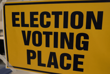 A sign saying 'election voting place'.