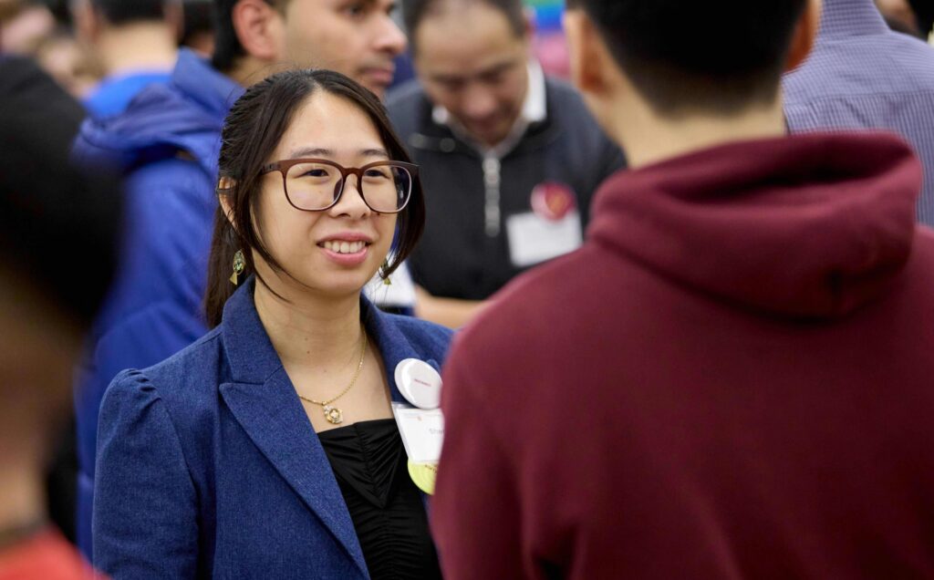 Grad networking at event.