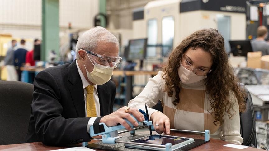 Minister Fedeli tours MMRI with demonstration from award-winning Mac Eng student